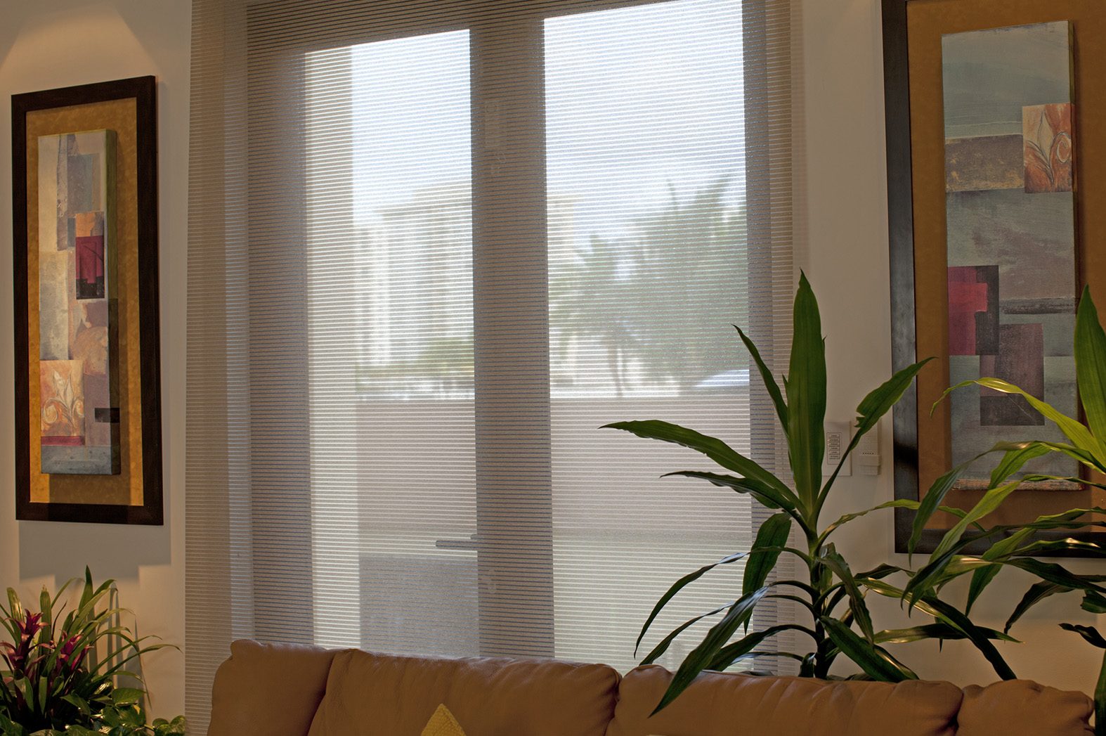 Interior solar screen filtering daylight while preserving the outdoor view